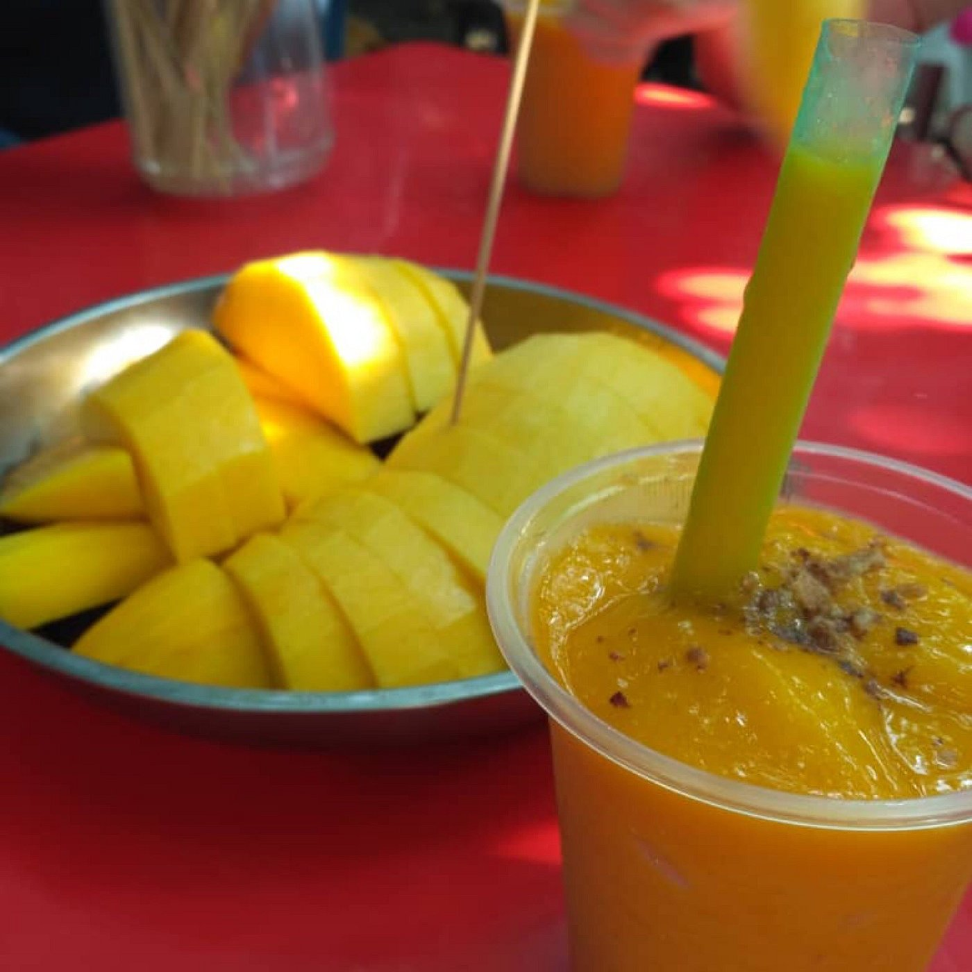 delicious dish of mangoes, and a mango drink