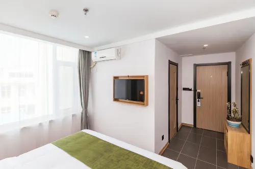 GreenTree Inn Zhixun (Dalian Zhoushuizi Airport Xinzhaizi Metro Station) الغرف Photos