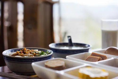 Lijiang Fengyasong Wenjinyuan Chinese Inn · Naxi Guyuan Ristorazione Photos