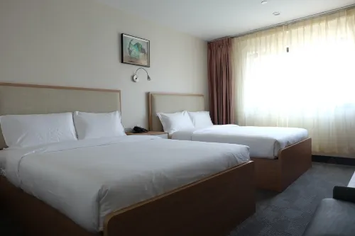 LIC Plaza Hotel Chambres Photos