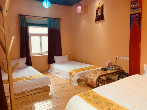 Yading Totem Boutique Inn Værelser Photos