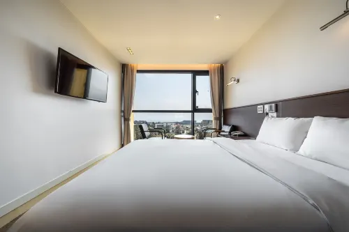 Sunrise Hotel Jungmun Branch Rooms Photos