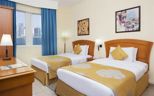 Golden Tulip Sharjah Номера Photos