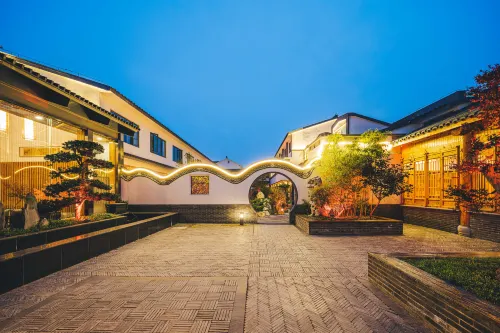 Yun He Ye Bo Hotel (Wuxi Lingshan Grand Buddha Nianhua Bay) من الخارج Photos