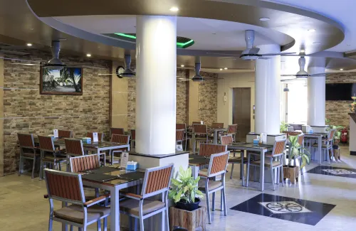 Triton Beach Hotel & Spa Restauration Photos
