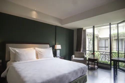 Swiss-Belhotel Rainforest Kamar Photos