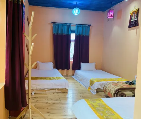 Yading Totem Boutique Inn Værelser Photos