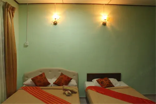 Tanjung Puteri Motel Chambres Photos