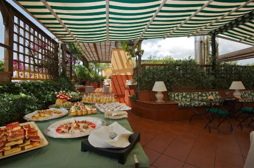 Hotel Diana Roof Garden Aree comuni Photos