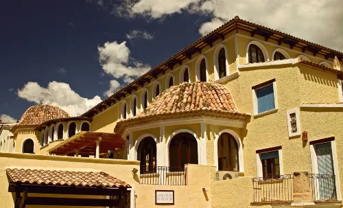 Occidental Pueblo Acantilado Extérieur Photos