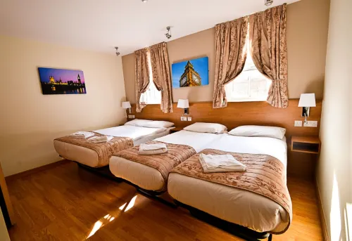 Kings Cross Inn Hotel Rum Photos