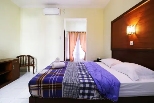 Teges Inn Kuta Photos