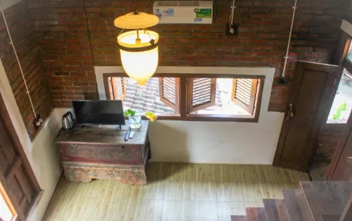 Griya Gribig Guest House Mitra RedDoorz Kamar Photos
