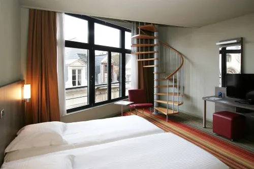 Alma Grand Place Hotel Photos
