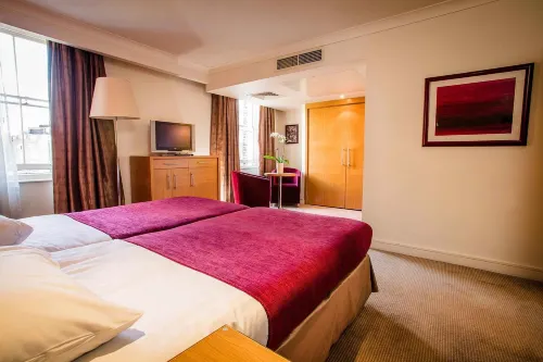 The Park City Grand Plaza Kensington Hotel Camere Photos