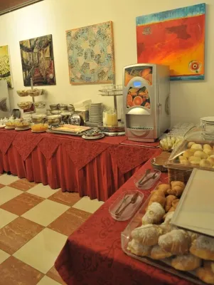 Hotel La Fenice et des Artistes Dining Photos