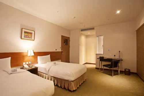 Taisugar Hotel Zimmer Photos