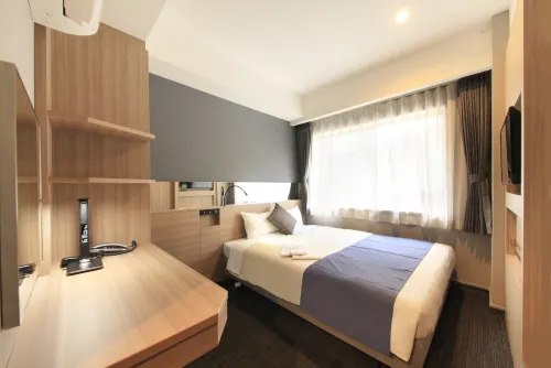 Quintessa Hotel Osaka Shinsaibashi Comic&Books Kamar Photos