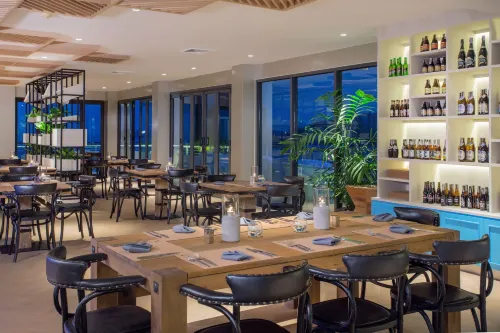Cape Sienna Gourmet Hotel & Villas Restauration Photos