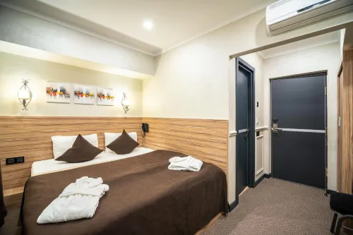Mildom City Hotel Chambres Photos
