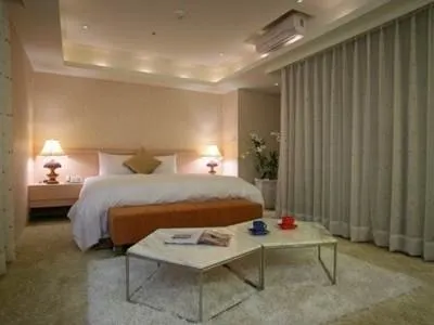 In One City Inn Chambres Photos