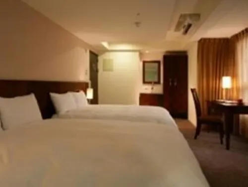 In One City Inn Chambres Photos
